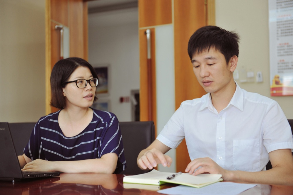 A teacher and coordinator reviewing a learning plan together